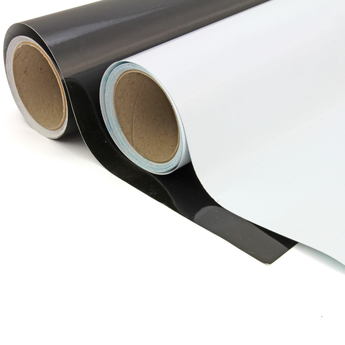 Black and white vinyl rolls with a glossy finish, ideal for crafting and weeding projects, showcasing smooth texture and flexibility